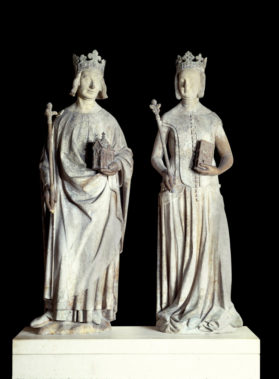 Art France: Ranskan kuninkaan Kaarle V:n patsaat, joka tunnetaan nimellä Kaarle Viisas (1338-1380) ja Ranskan kuningatar Jeanne de Bourbon (1337-1378). Kalkkikiviveistos 1300-luvulta. Luultavasti Louvren itäisen sisäänkäynnin julkisivusta (sisustus tekijältä French School