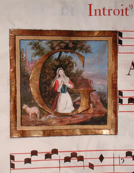Historiallinen alkukirjain "G", joka kuvaa St. Genevieveä vartioimassa laumaansa, St. Genevievelle omistetun messun käsikirjoituksesta tekijältä French School