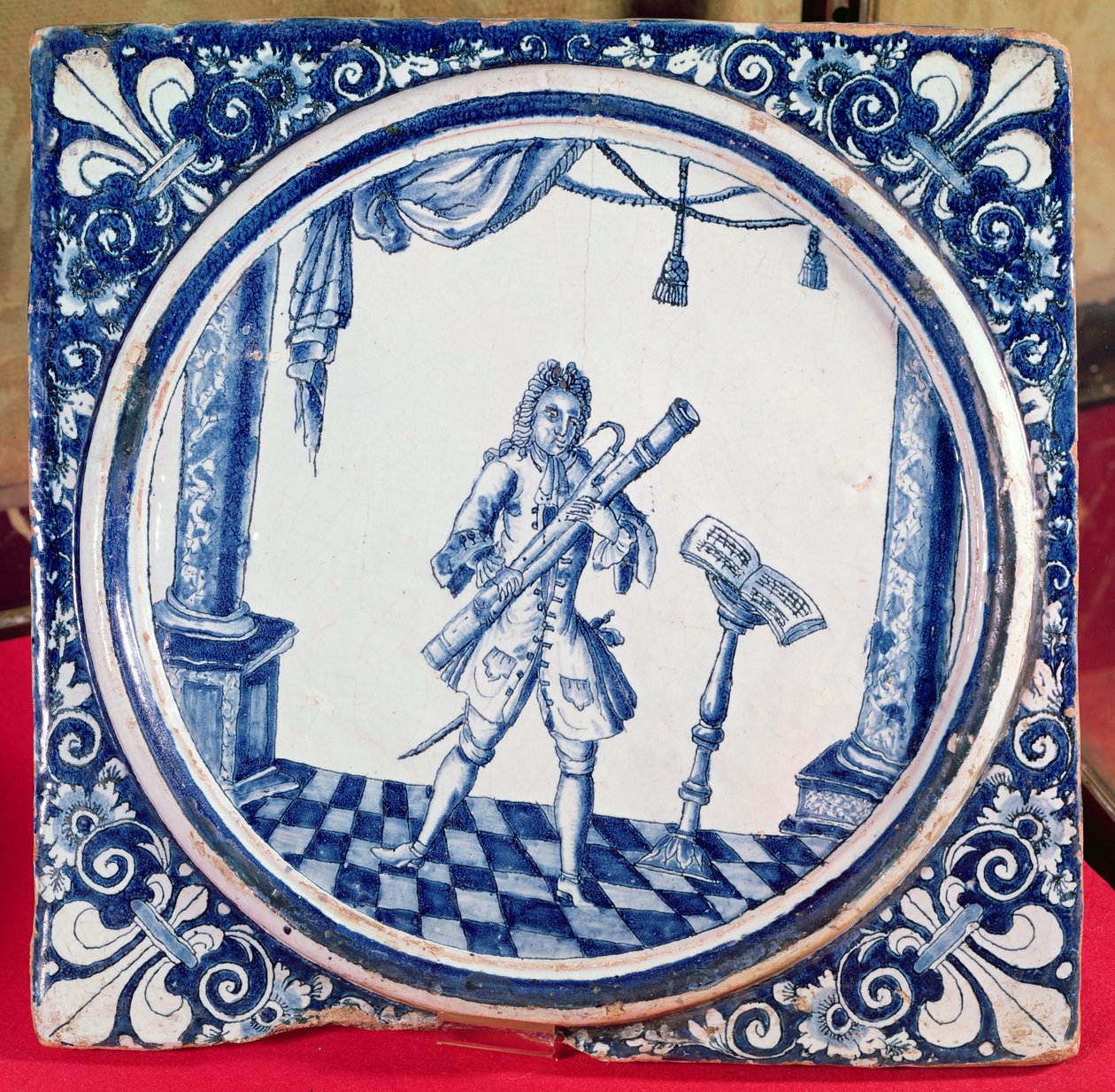 Fagottistia kuvaava laatta, 1706 (fajanssi) tekijältä French School