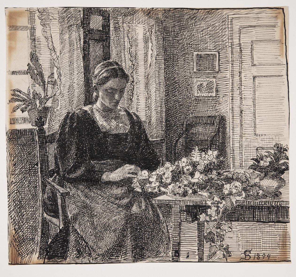 Vaimoni (rouva Anna Syberg) sitoo seppeleen tekijältä Fritz Syberg