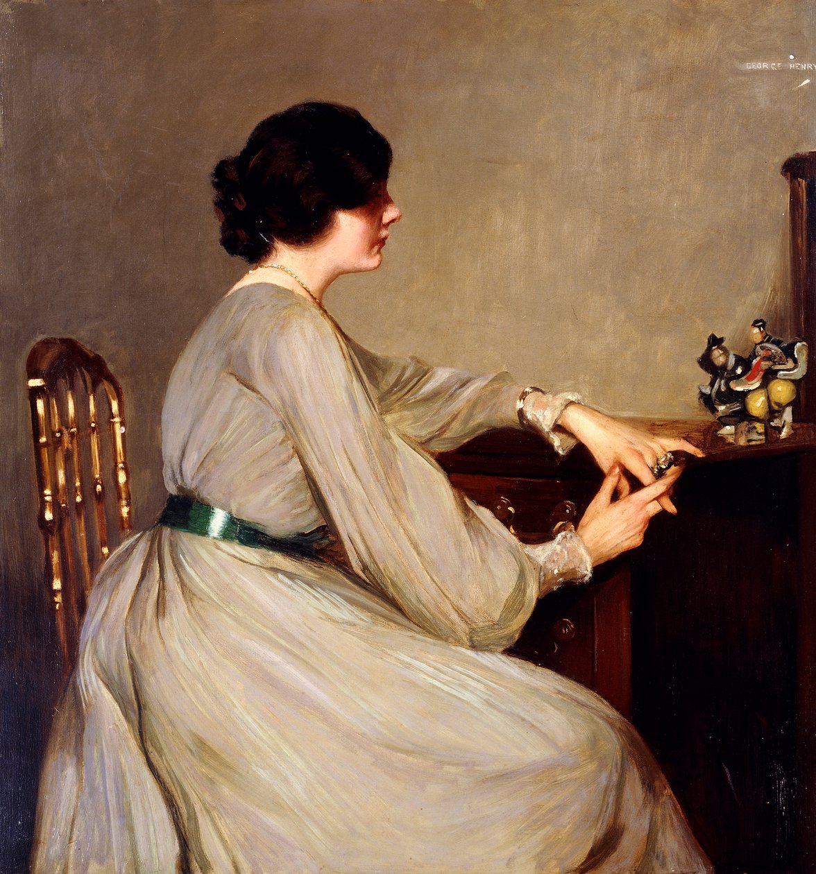 Nainen harmaassa tekijältä George F. Henry