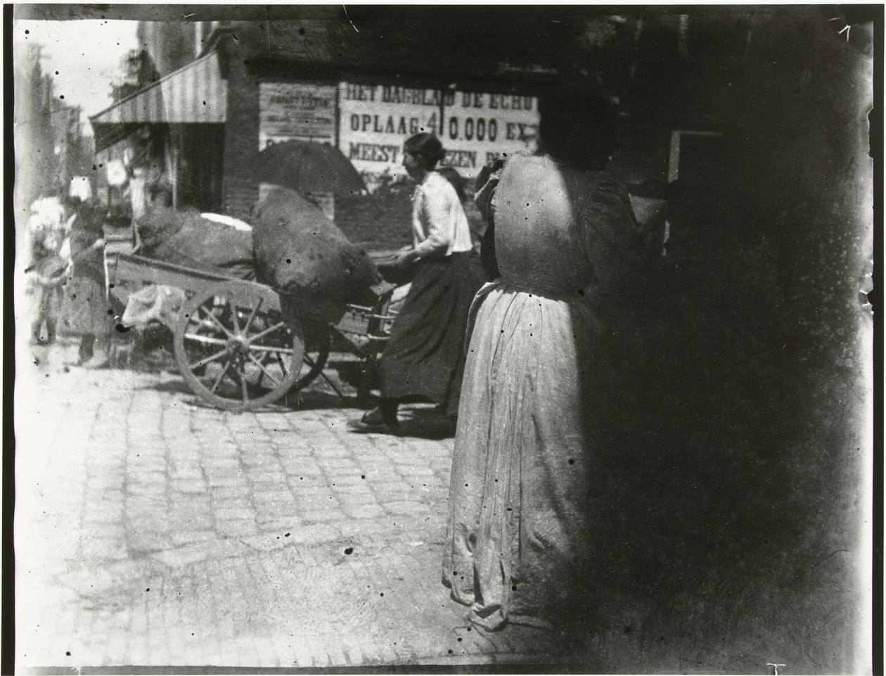 Aktiviteetteja Houtkopersdwarsstraatilla ja Jodenbreestraatilla Amsterdamissa tekijältä George Hendrik Breitner