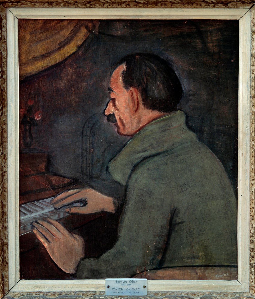 Ranskalaisen taidemaalarin Maurice Utrillon (1883-1955) muotokuva. Georges Karsin (1882-1955) maalaus, 1900-luku. Öljy kankaalle. Koko: 0,56 x 0,47 m. Lyon. Kuvataidemuseo. Varovainen! Tämän teoksen käyttö voi edellyttää kolmannen osapuolen lupapyyntöä tai tekijältä Georges Kars