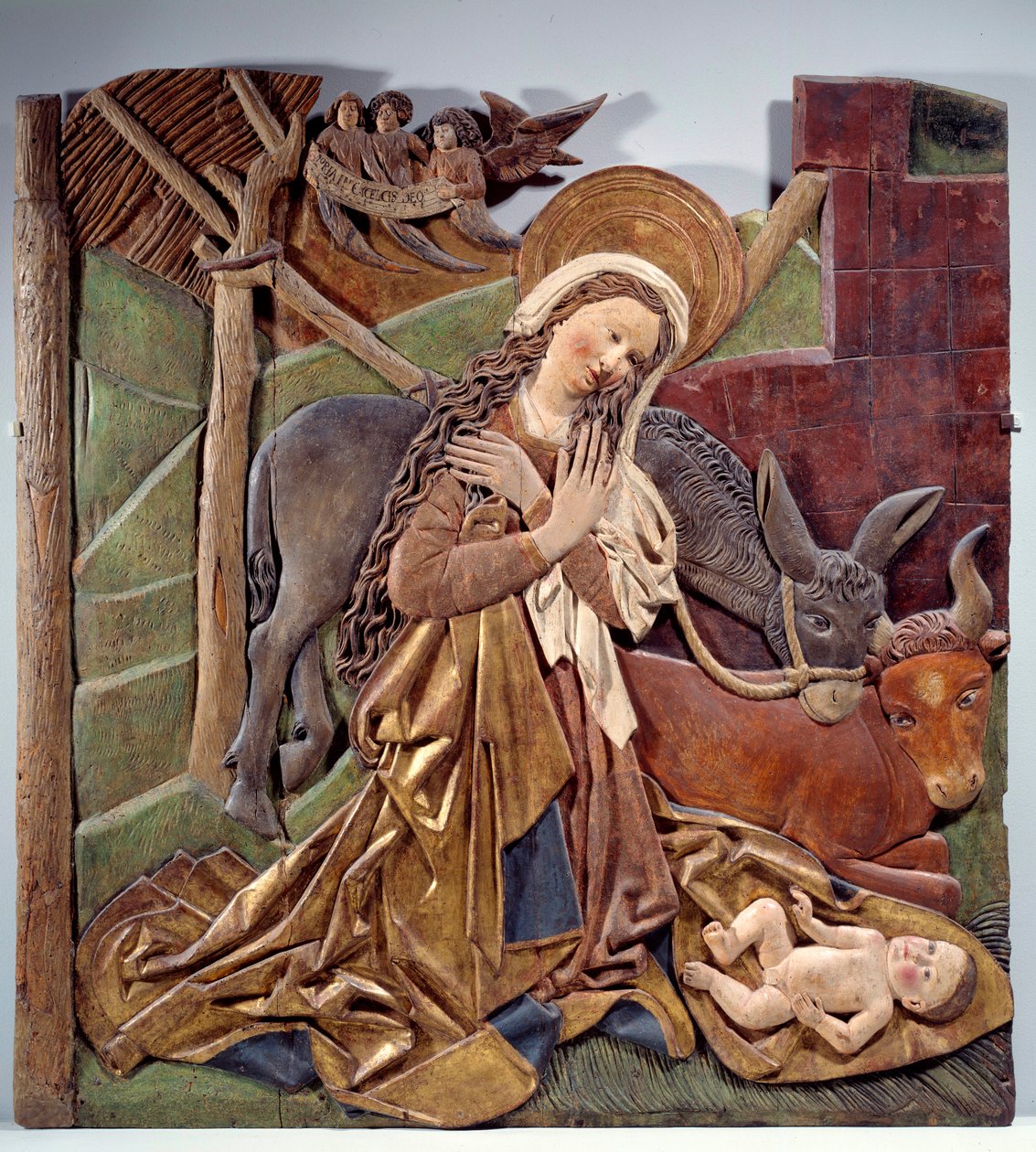 Nativite Reliefi alttaritaulun sisäpuolella saksalaisen koulun moniväristä puuta. 1510 Koko 1,12x1,11 m Pariisi, Musee du Louvre tekijältä German School