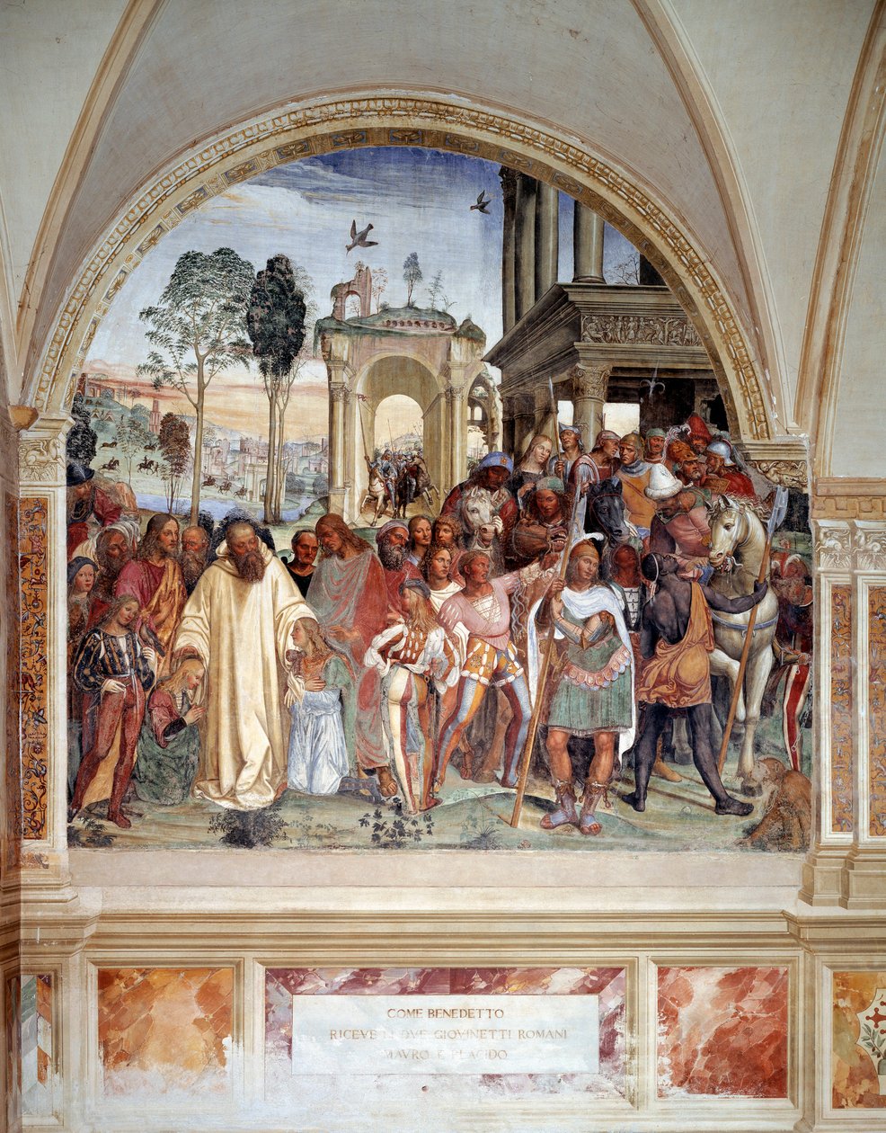 Benoit vastaanottaa kaksi nuorta roomalaista Maurin ja Placiden (pyhä Benedictus vastaanottaa kaksi romaanipoikaa Mauron ja Placidon) Antonio Bazzi dit il Sodoman (1477 - 1549) luostarin fresko, joka kertoo pyhän Benedict of Nursielaisen (480 - 567) perust tekijältä Giovanni Antonio Bazzi Sodoma