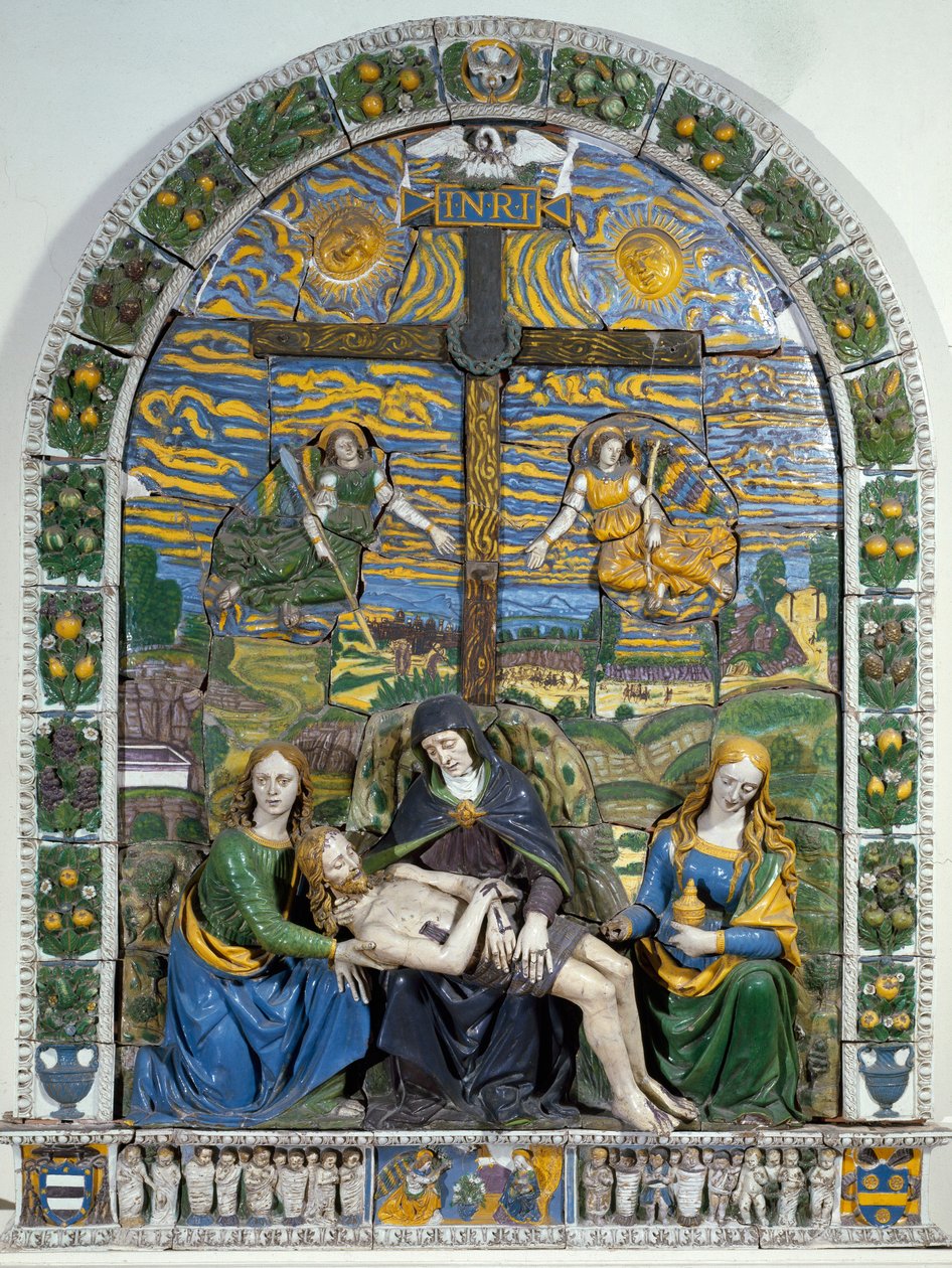 Laskeuma (Pieta) Jeesus Kristus ja Neitsyt Maria Pyhän Johanneksen ja Pyhän Maria Magdaleenan ympäröimänä ennen ristiä, jossa on merkintä INRI (I.N.R.I.). Matalakohokeramiikka, Giovanni della Robbia (1469-1529) Dim. 3x2,28 m Firenze, Museo Nazionale tekijältä Giovanni della Robbia