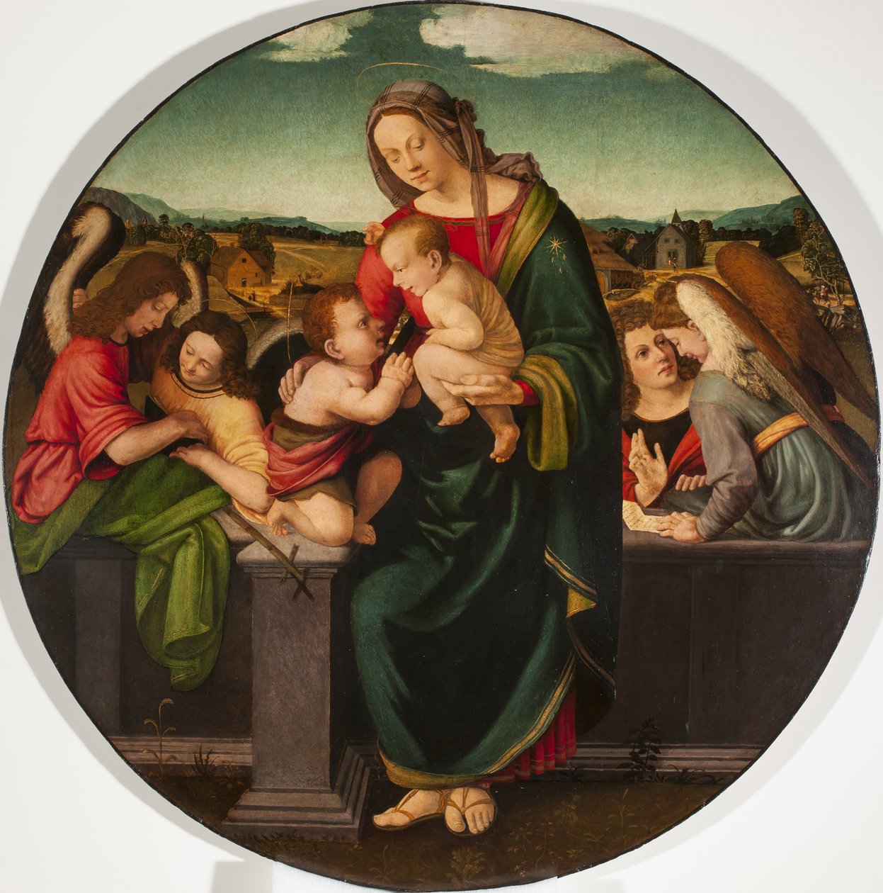 Madonna ja lapsi pikkulapsen Pyhän Johannes Kastajan ja enkelien kanssa, n. 1515 tekijältä Giuliano Bugiardini