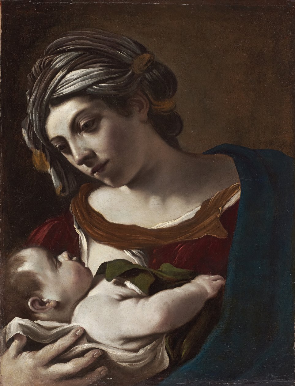 Neitsyt ja lapsi tekijältä Guercino (1591 1666)