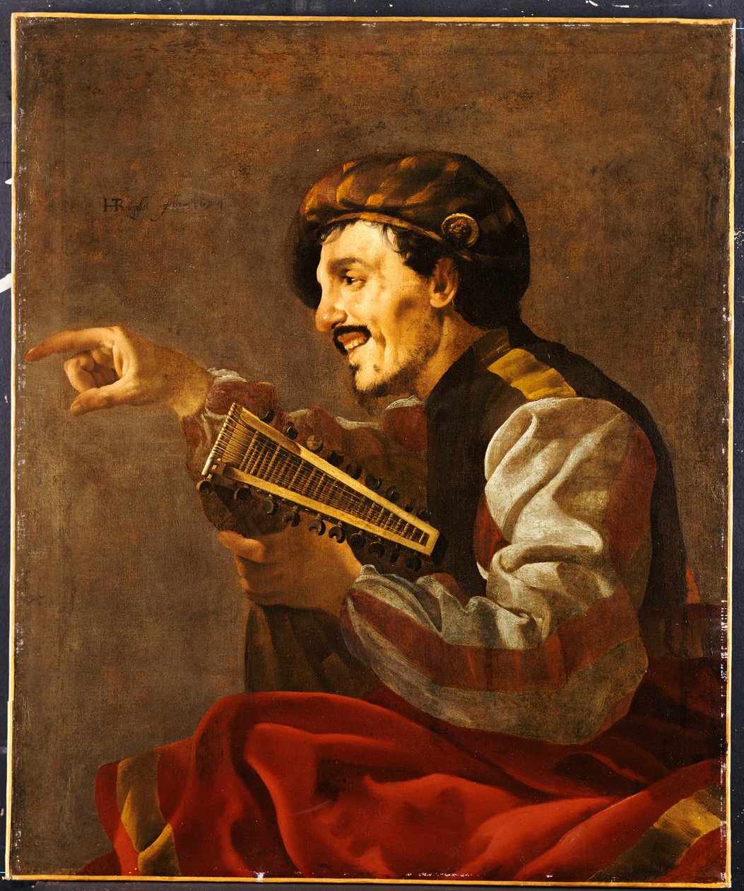 Istuva lutanisti osoittaa tekijältä Hendrick ter Brugghen
