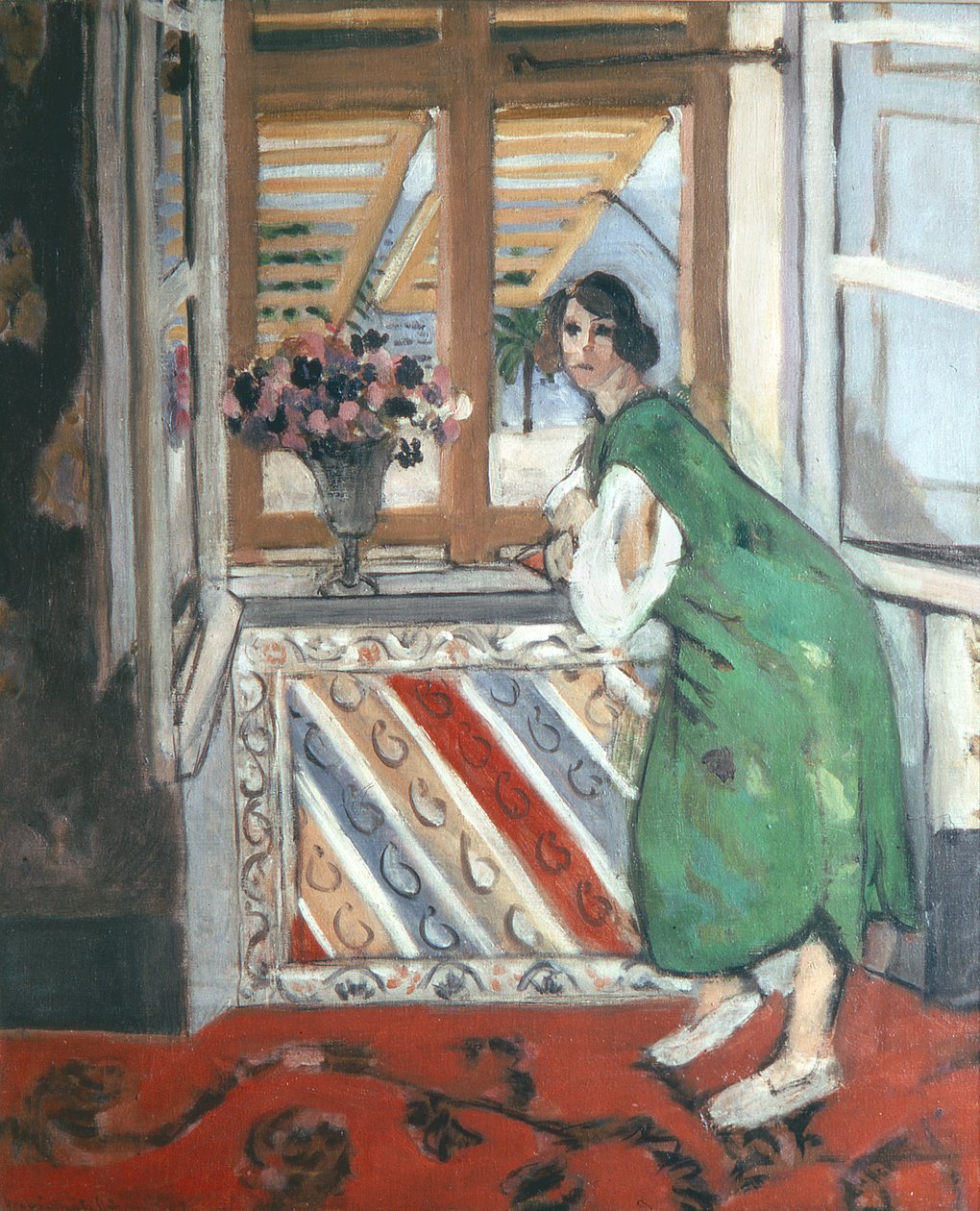Sisätilat Nizzassa: Nuori nainen vihreässä mekossa nojaa ikkunaan tekijältä Henri Matisse