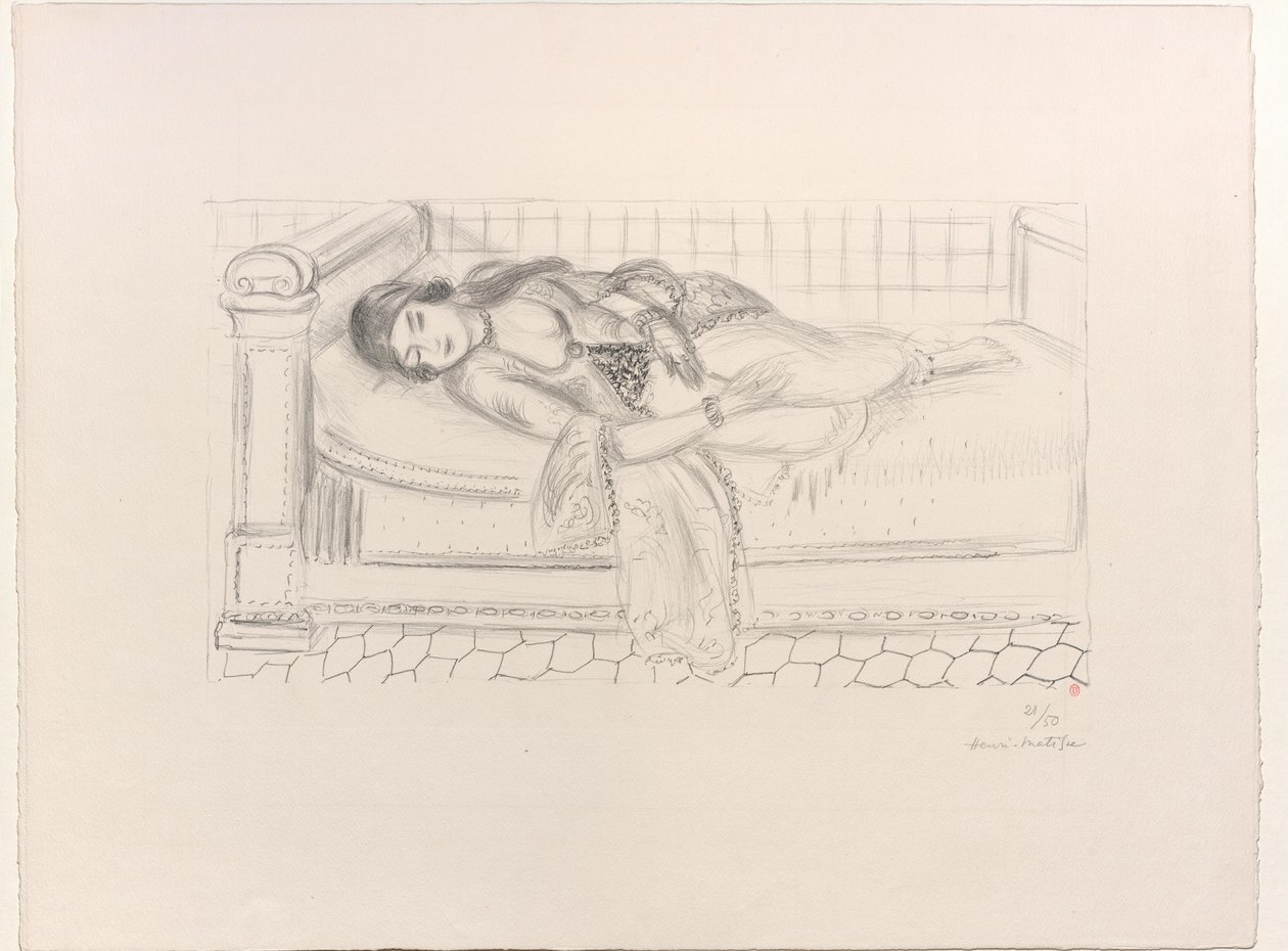 Itämainen naisen kuva lepotuolilla, punaisella laattalattialla tekijältä Henri Matisse