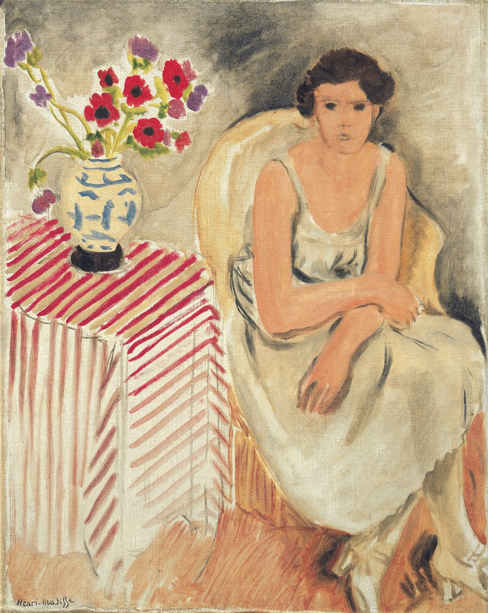 Nainen tuolilla - Kukkia pöydällä, tai neilikoita. tekijältä Henri Matisse