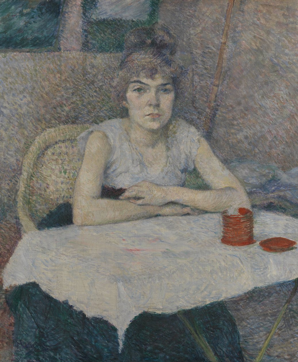 Nuori nainen pöydän ääressä tekijältä Henri de Toulouse Lautrec