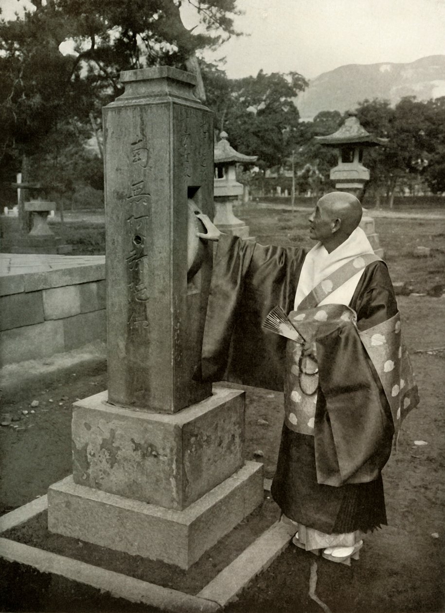 Buddhalainen pappi ja rukouspyörä, 1910. tekijältä Herbert Ponting