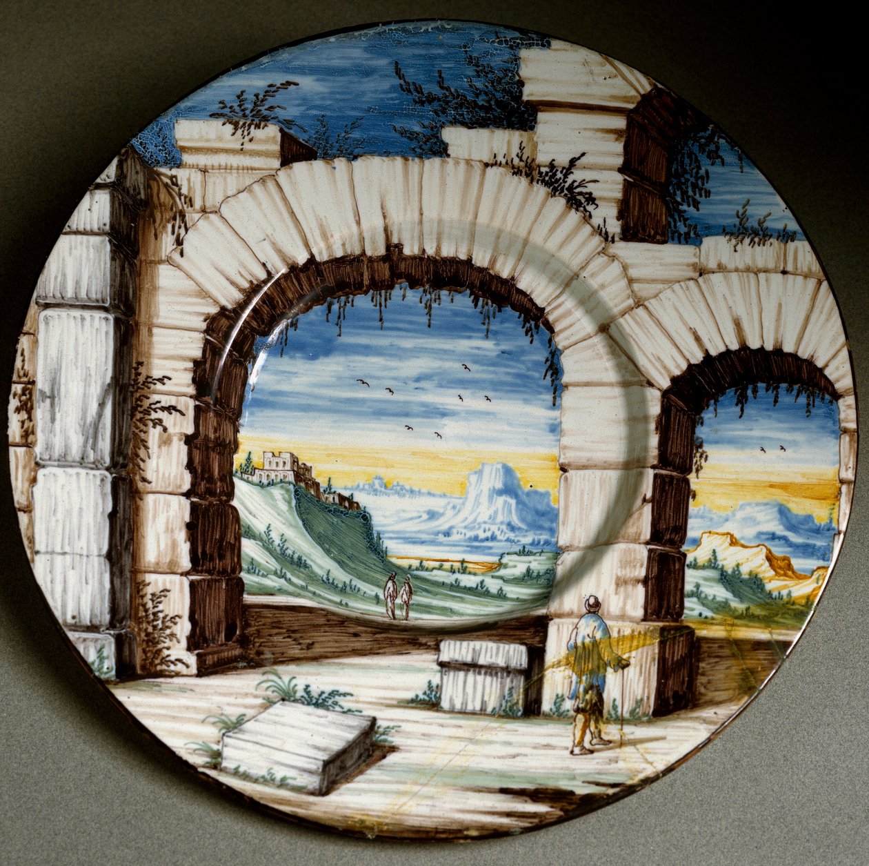 Raunio ja maisema. Keraaminen levy valmistettu Angaranossa, Italiassa. Noin 1650 Firenze, Museo Nazionale del Bargello tekijältä Italian School
