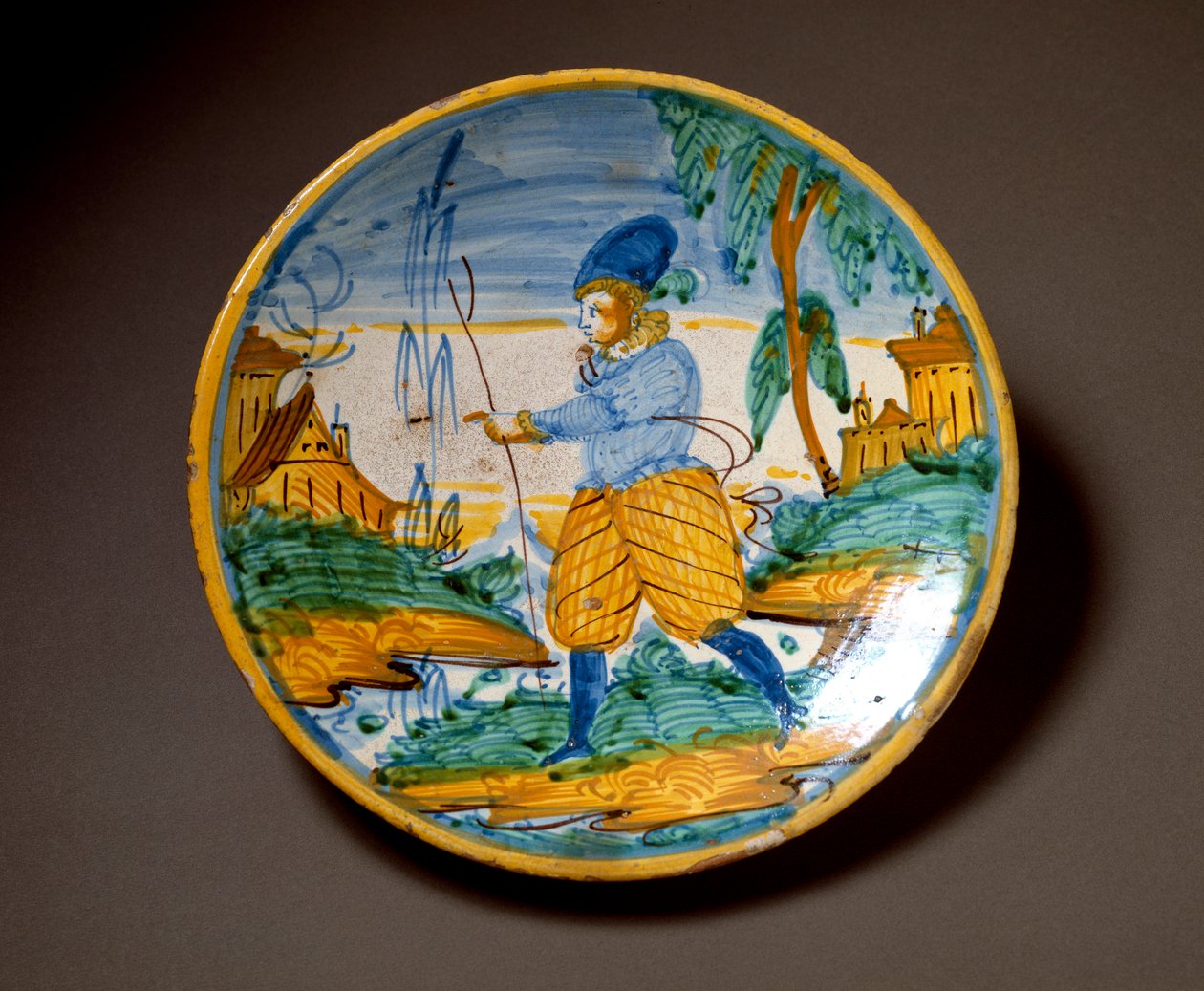 Aateliston nuori mies. Keraaminen levy valmistettu Viterbossa, Italiassa. 1500-luvun loppu Firenze, Museo Nazionale del Bargello tekijältä Italian School