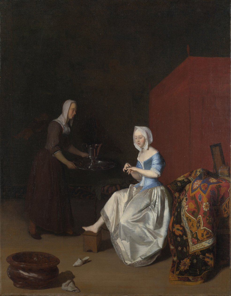 Nuori nainen leikkaamassa kynsiään, mukana palvelijatar, n. 1670 tekijältä Jacob Lucasz. Ochtervelt