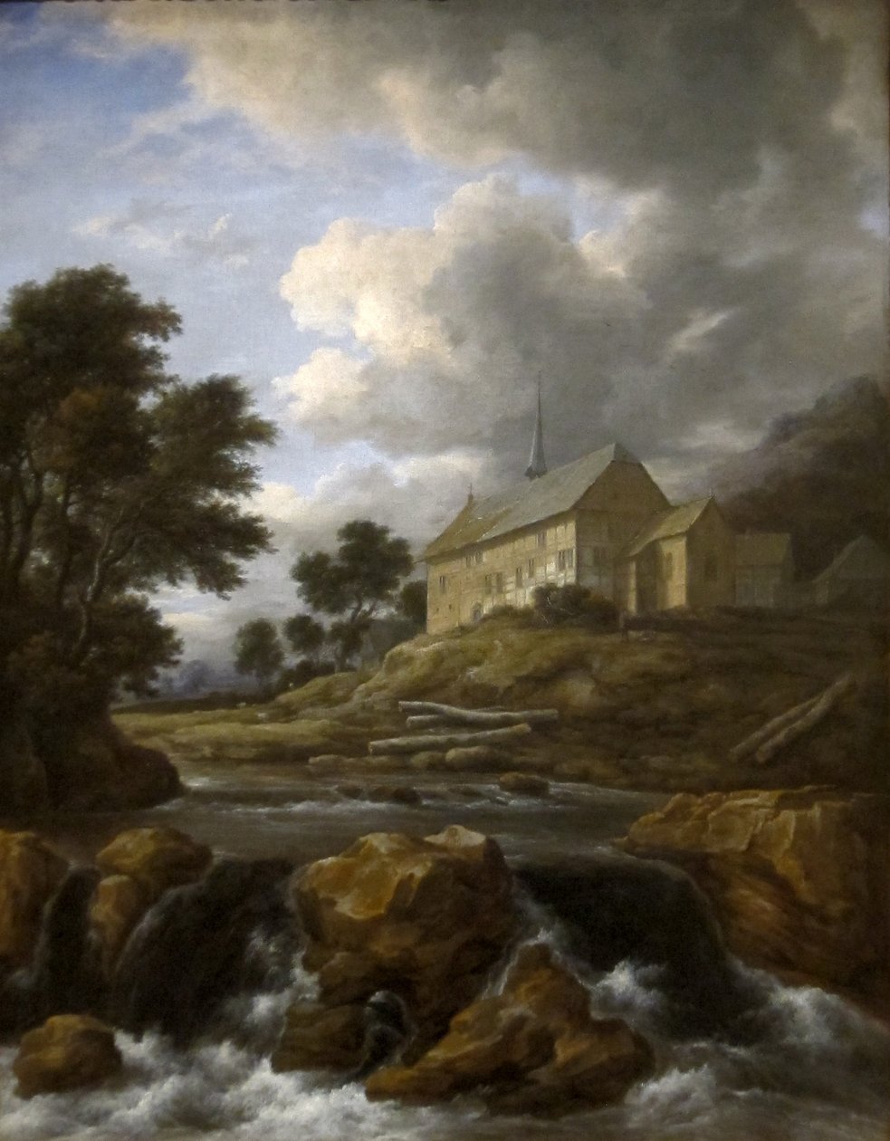 Maisema, jossa on kirkko virran varrella tekijältä Jacob van Ruisdael