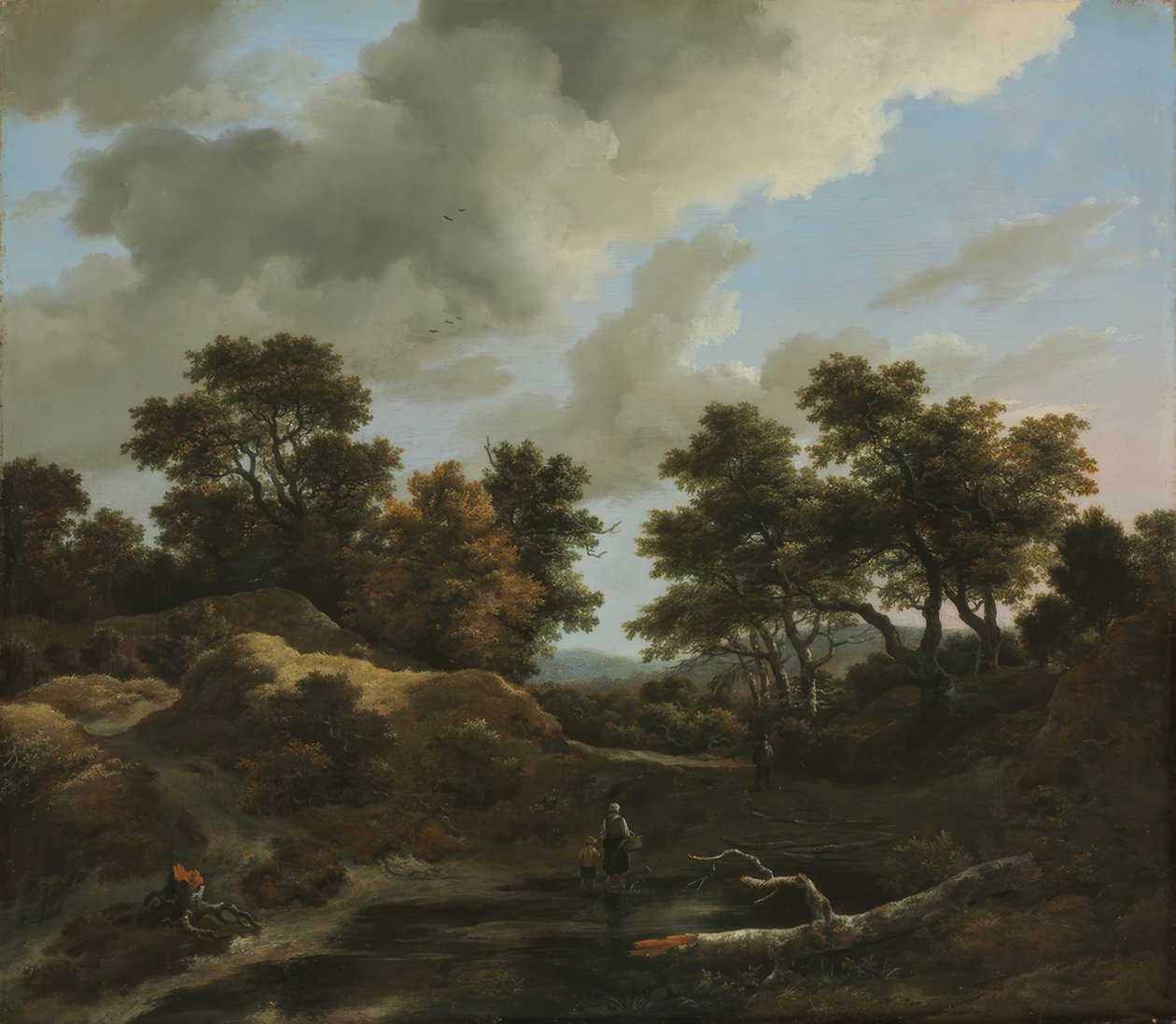 Metsäinen ja mäkinen maisema tekijältä Jacob van Ruisdael
