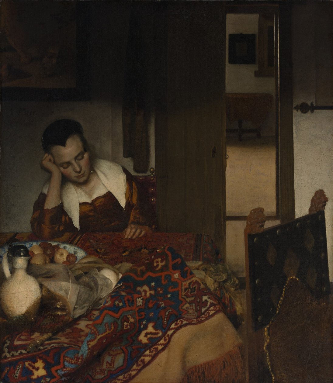 Tyttö nukkuu pöydässä tekijältä Johannes Vermeer