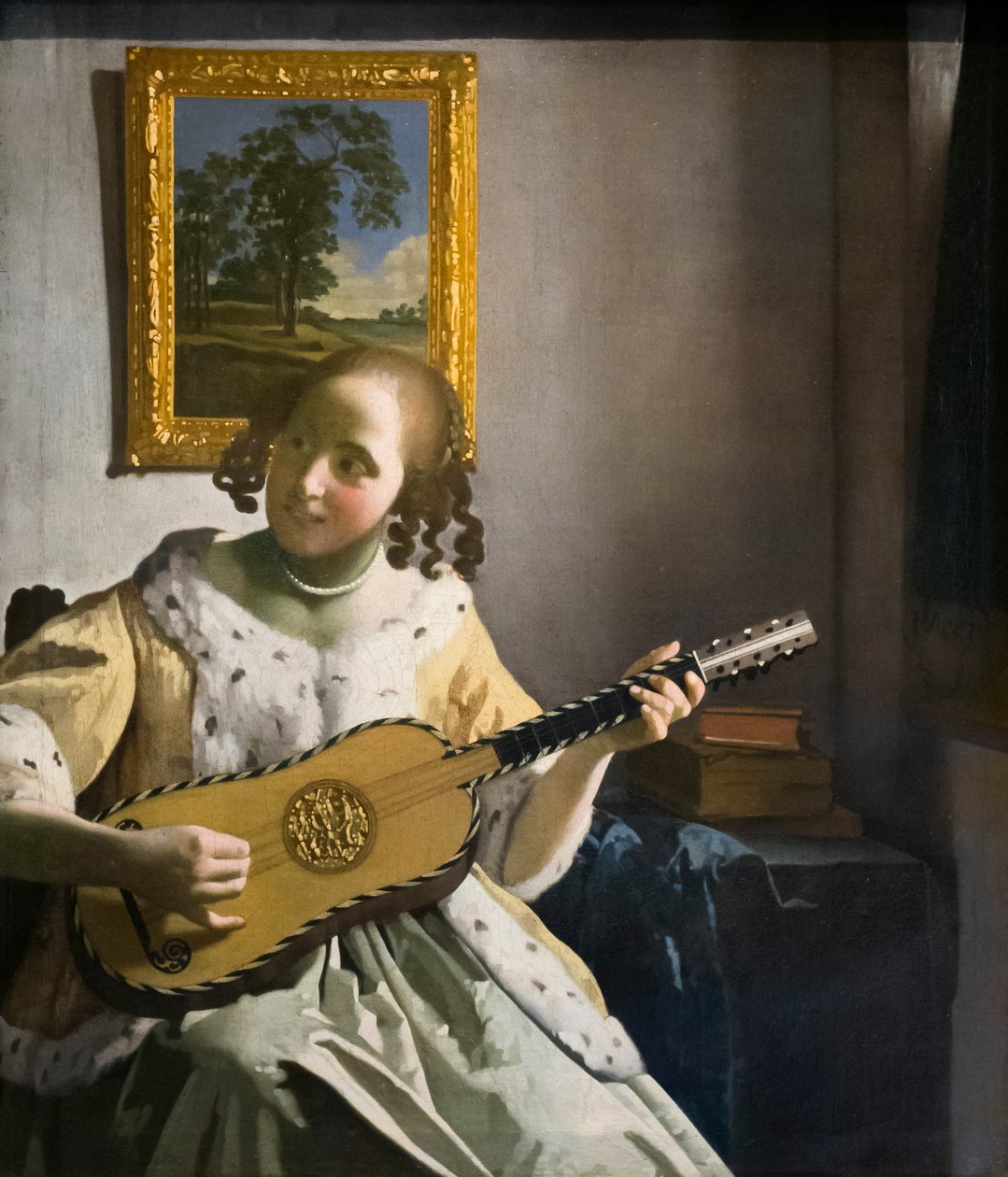Kitaristi, n. 1672 (öljy kankaalle) tekijältä Jan Vermeer van Delft