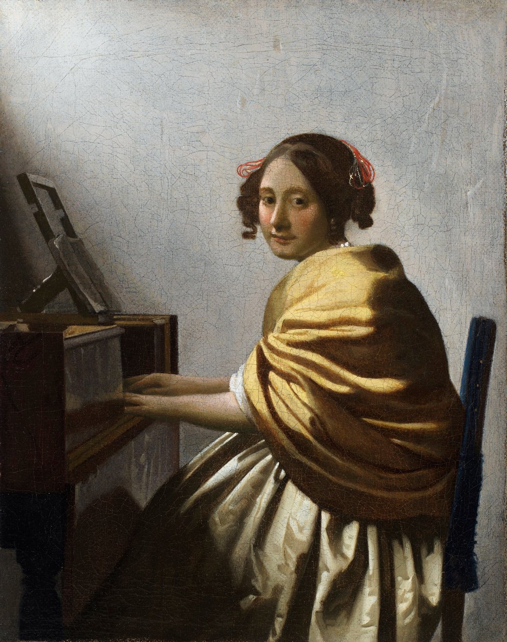 ""Young Woman Seated at a Virginal"" (A Young Woman seating at a Virginal) maalaus Jan Vermeer (Johannes) (1632-1675) noin 1670 Koko 25,1x20 cm Yksityinen kokoelma tekijältä Johannes Vermeer