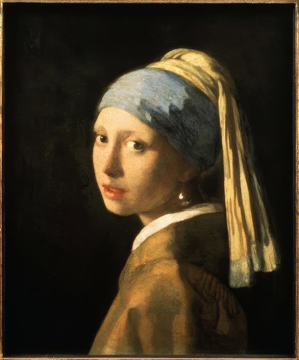 Tyttö helmen kanssa tekijältä Jan Vermeer van Delft
