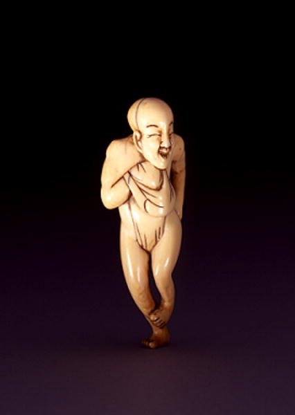 Netsuke hevosnaamasta, kupolipäisestä miehestä, luultavasti Osakasta, n. 1800-20 (norsunluu) (katso myös 193635) tekijältä Japanese School