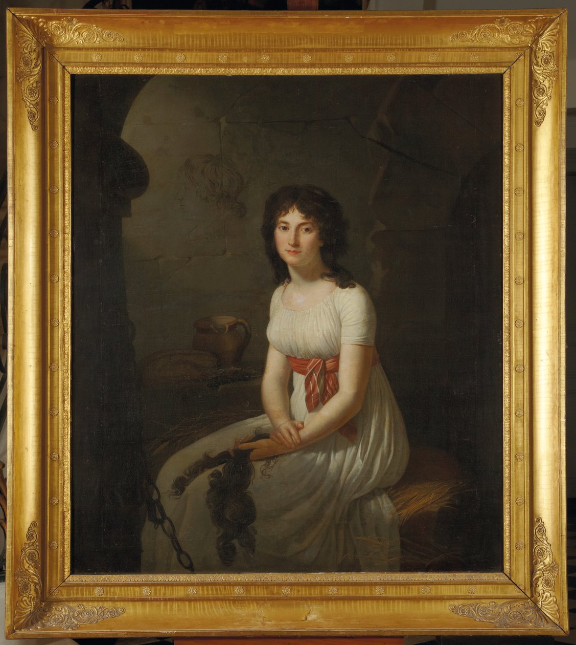 Kansalainen Tallien La Forcen vankilan sellissä piteleen leikattuja hiuksiaan, 1796 tekijältä Jean Louis Laneuville