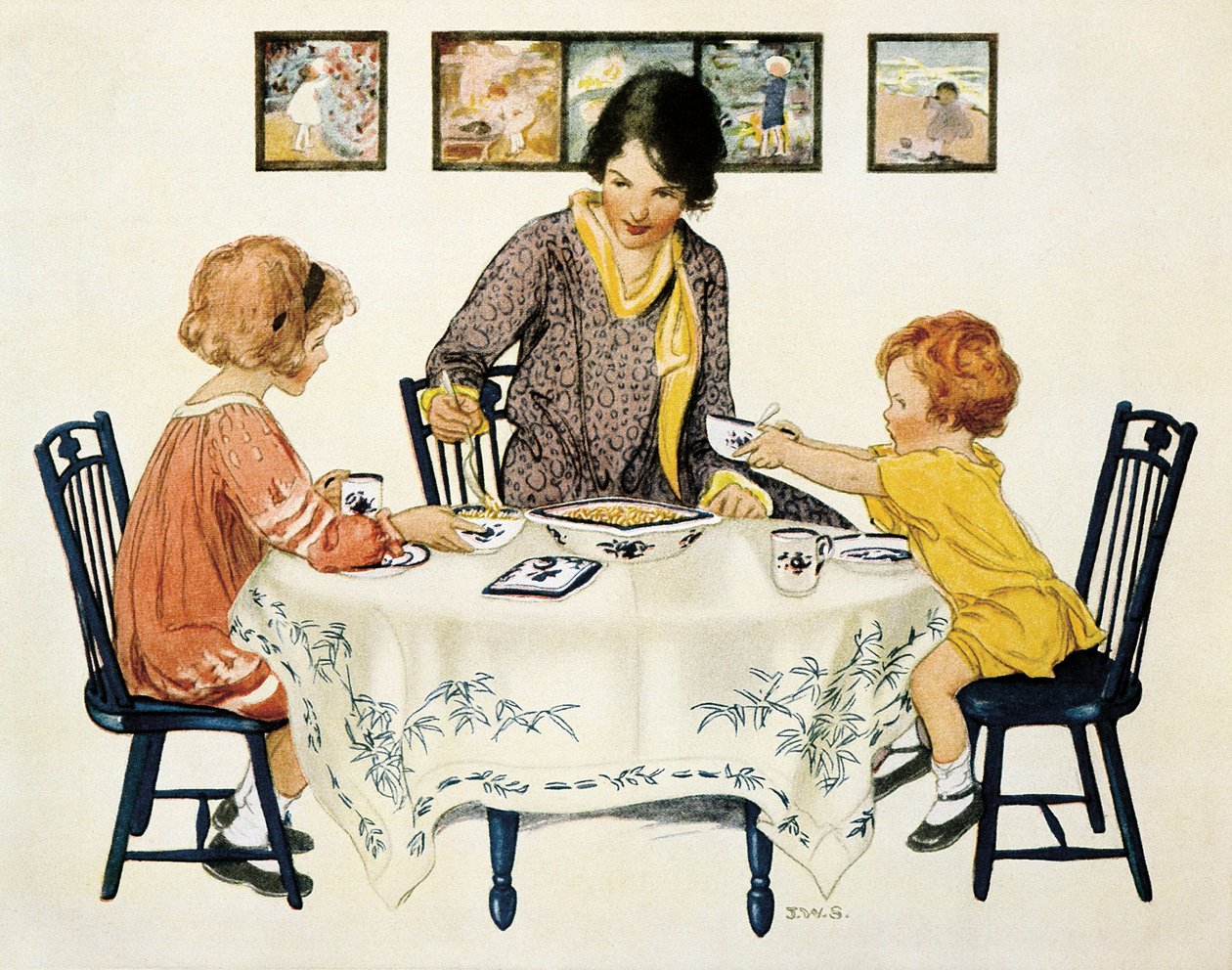 Perhe (äiti ja lapset) kokoontuivat pöydän ympärille syömässä pastaa tekijältä Jessie Willcox Smith