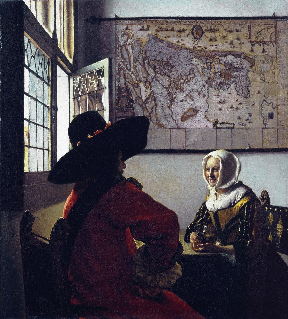 Upseeri ja naurava tyttö tekijältä Jan Vermeer van Delft
