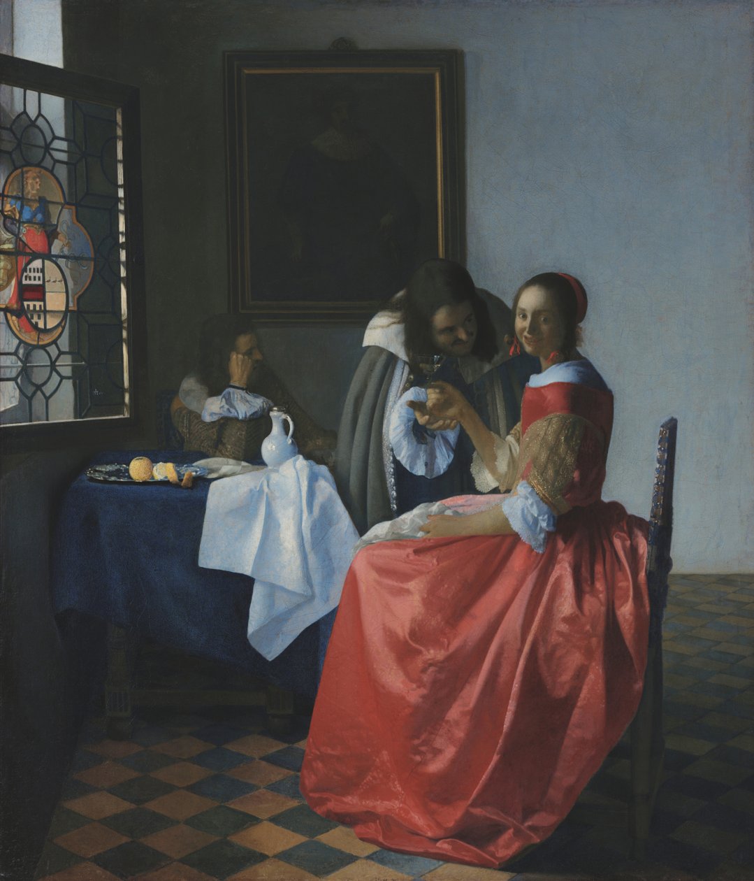 Nuori nainen viinilasin kanssa tekijältä Johannes Vermeer