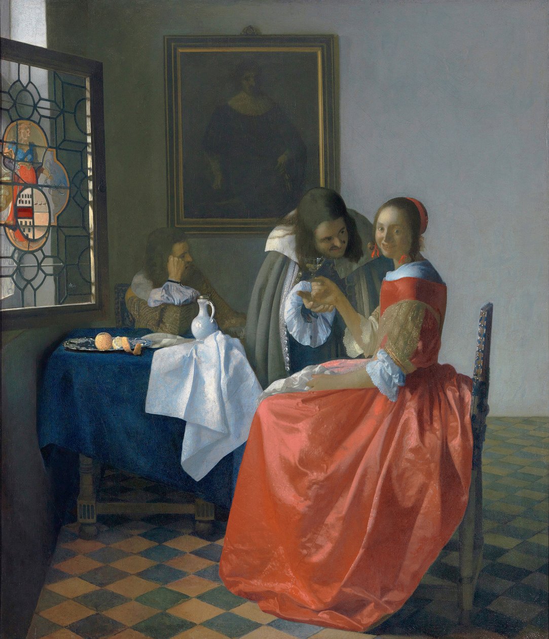 Nuori nainen viinilasin kanssa tekijältä Johannes Vermeer