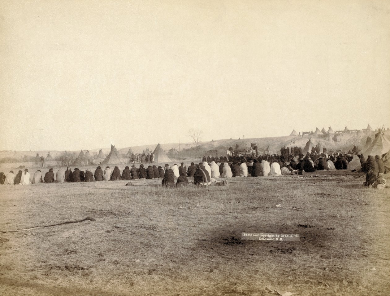 Intiaanineuvosto vihamielisessä leirissä, 1891 tekijältä John C. H. Grabill
