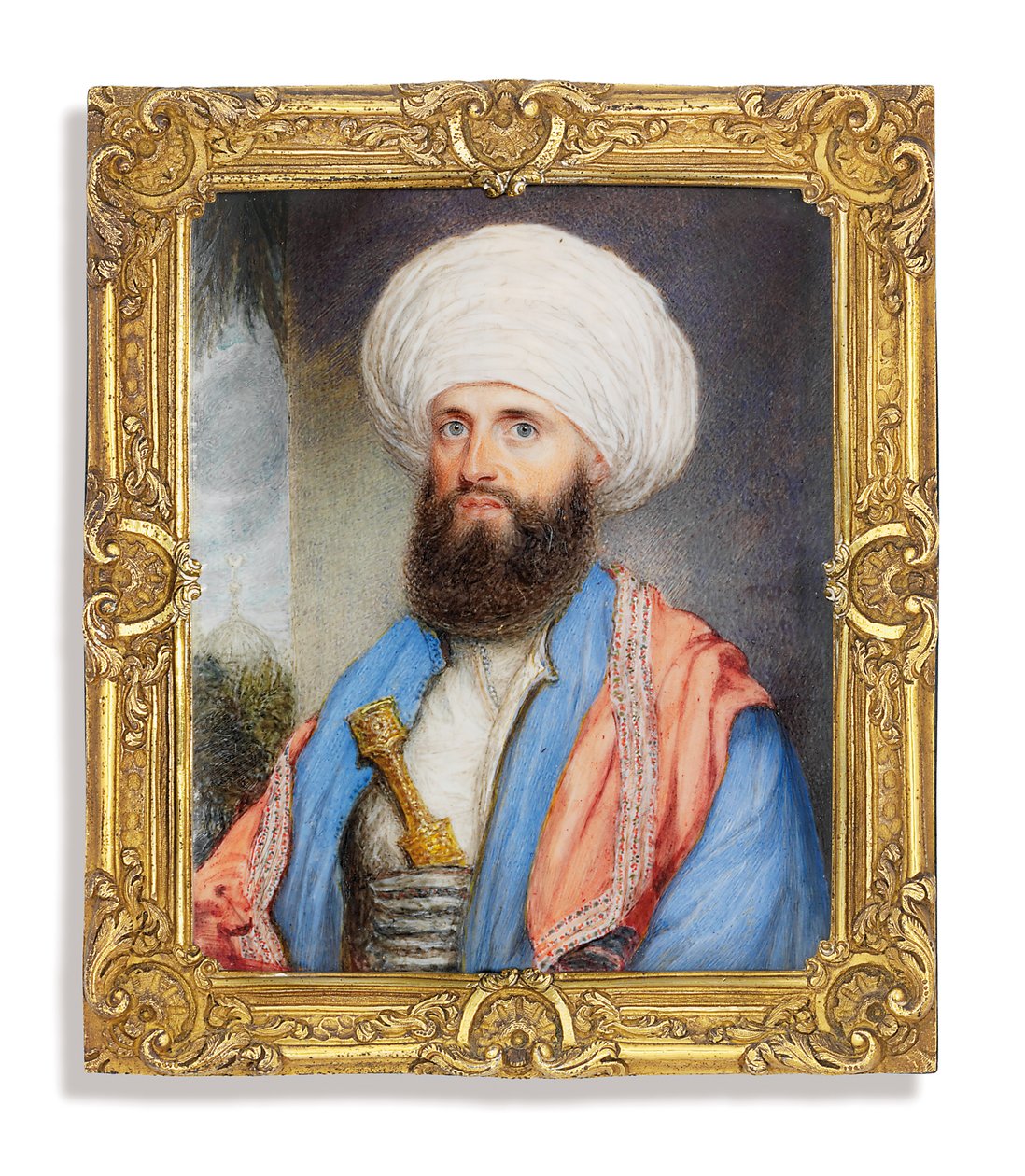 James Silk Buckingham (1786-1855), valkoisessa paidassa vaaleansininen takki, vaaleanpunainen brodeerattu huivi olkapäillä ja valkoinen turbaani, jossa tikari kiinnitettynä hänen cummerbundinsa, maisema tausta moskeijalla tekijältä John Jukes