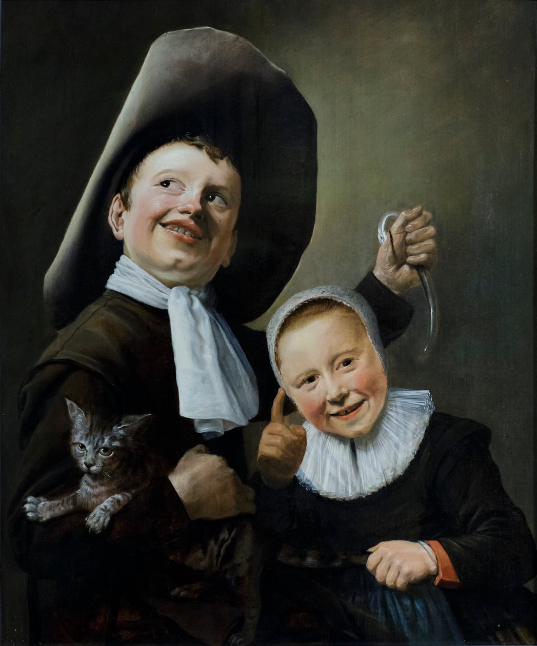 Poika ja tyttö kissan ja ankeriaan kanssa, noin 1635 (öljy tammelle). tekijältä Judith Leyster