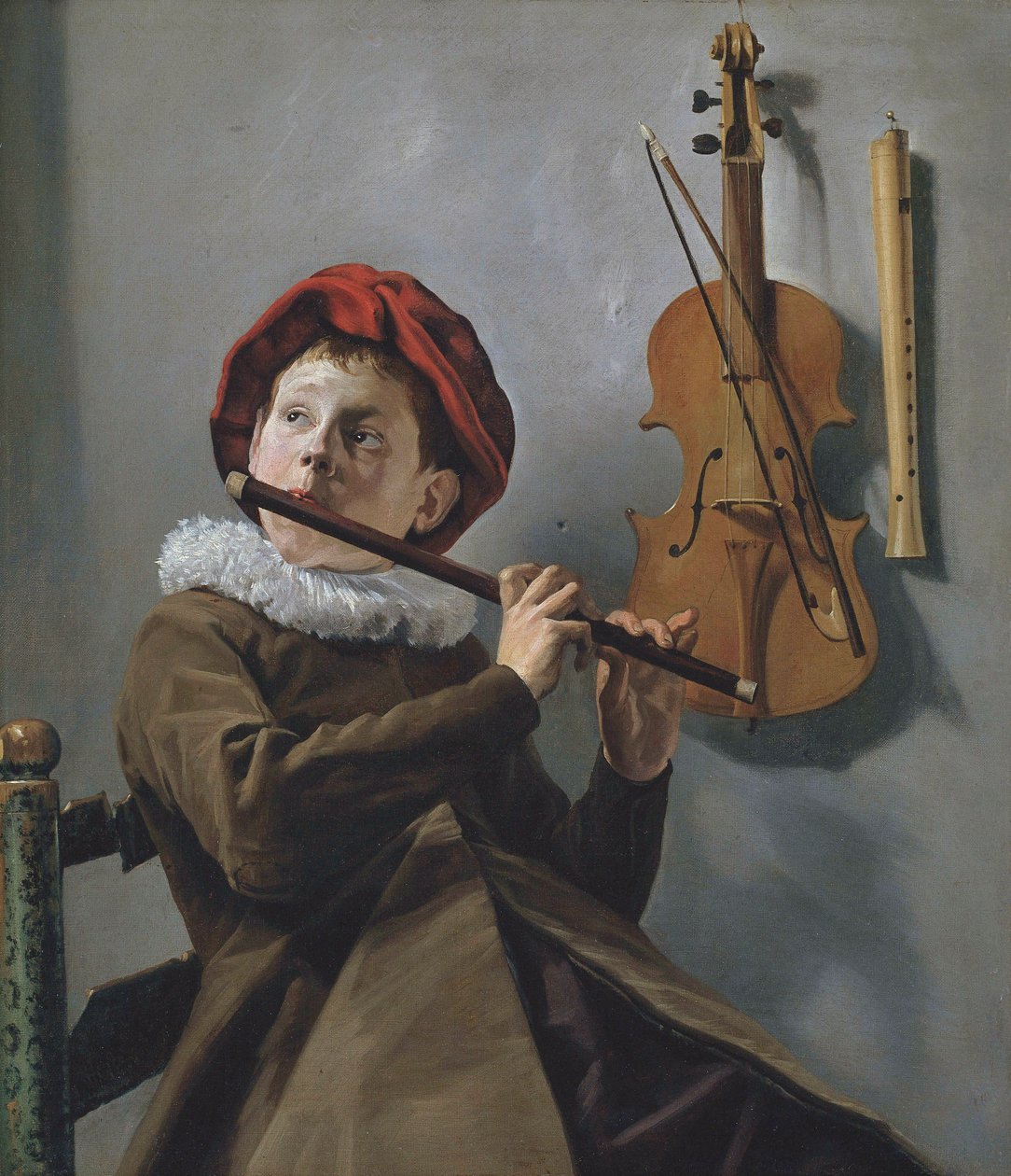 Poika soittaa huilua tekijältä Judith Leyster