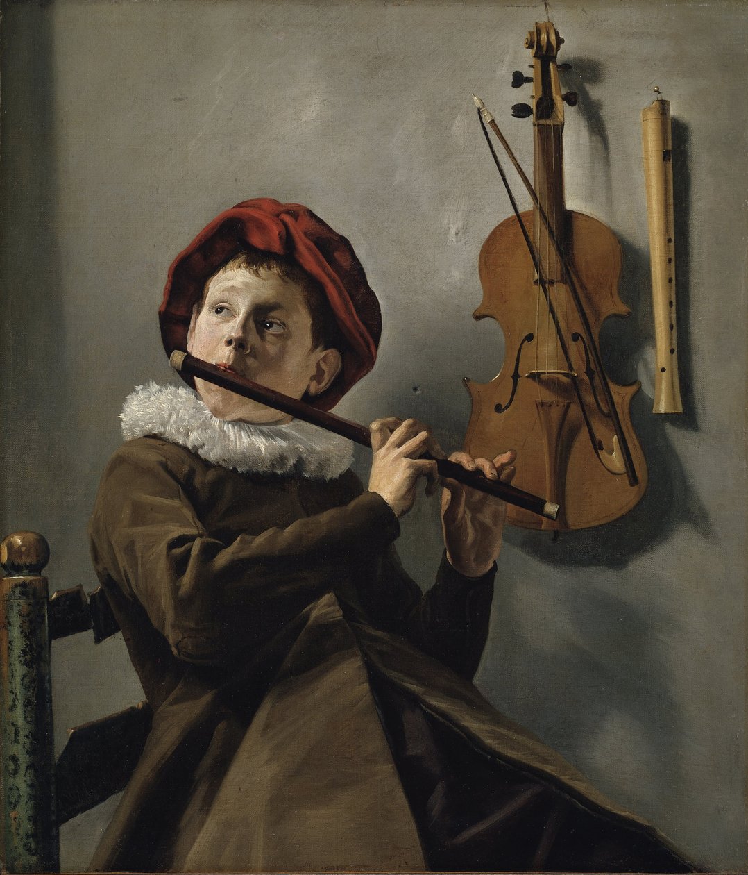 Poika soittaa huilua tekijältä Judith Leyster