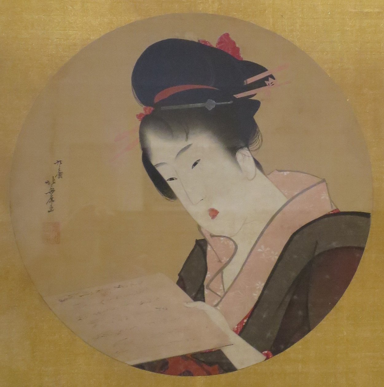 Nainen lukee kirjettä tekijältä Katsushika Hokusai