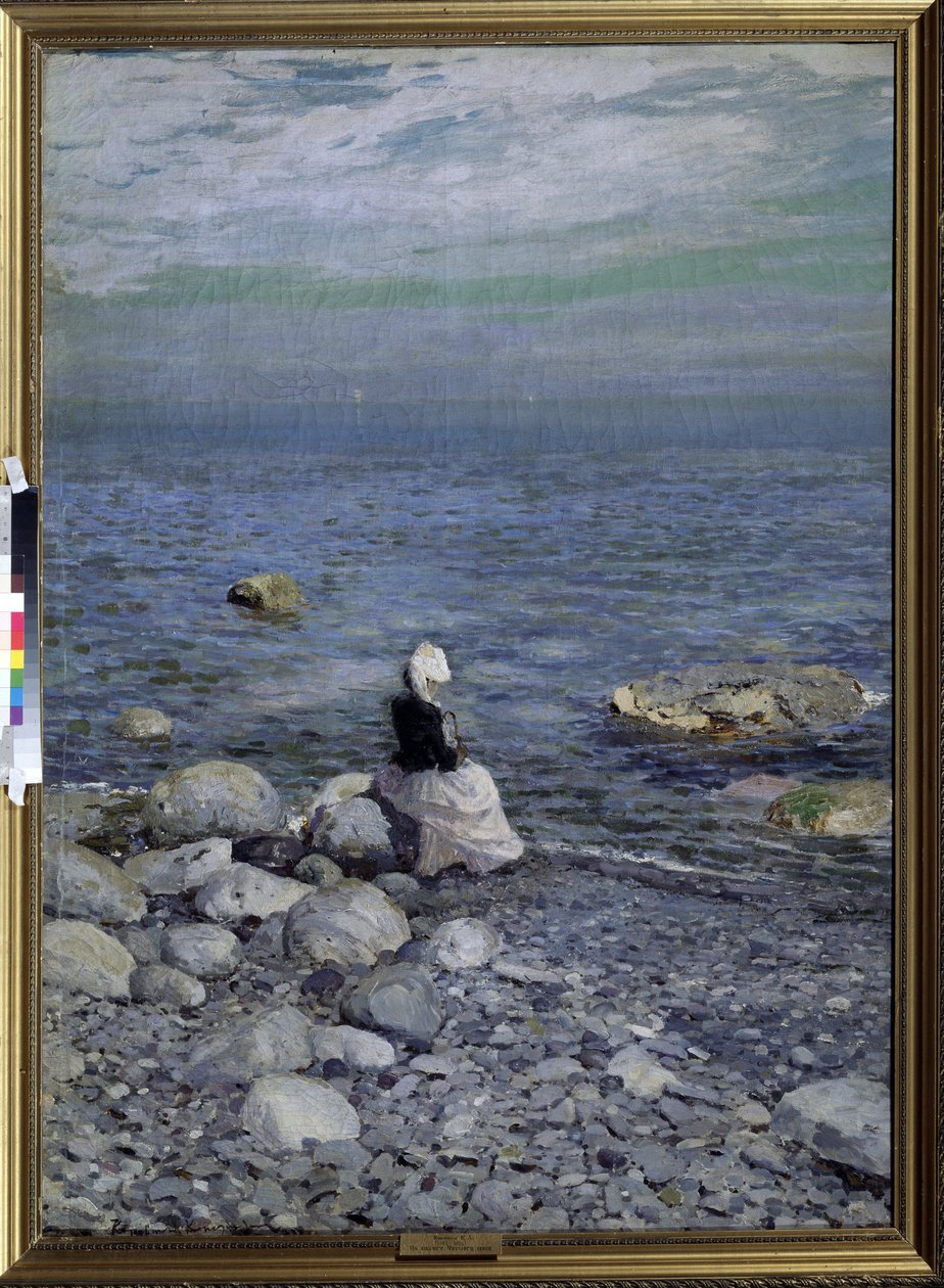Mustanmeren rannalla (Mustanmeren rannalla). Yksinäinen, elegantti nainen istuu rannan kallioilla ja katselee horisonttia meren ylle Konstantin Aleksejevitš Korovin (Konstantin Korovin) (1861-1939) maalaus, öljy kankaalle, noin 1890. tekijältä Konstantin Alekseevich Korovin