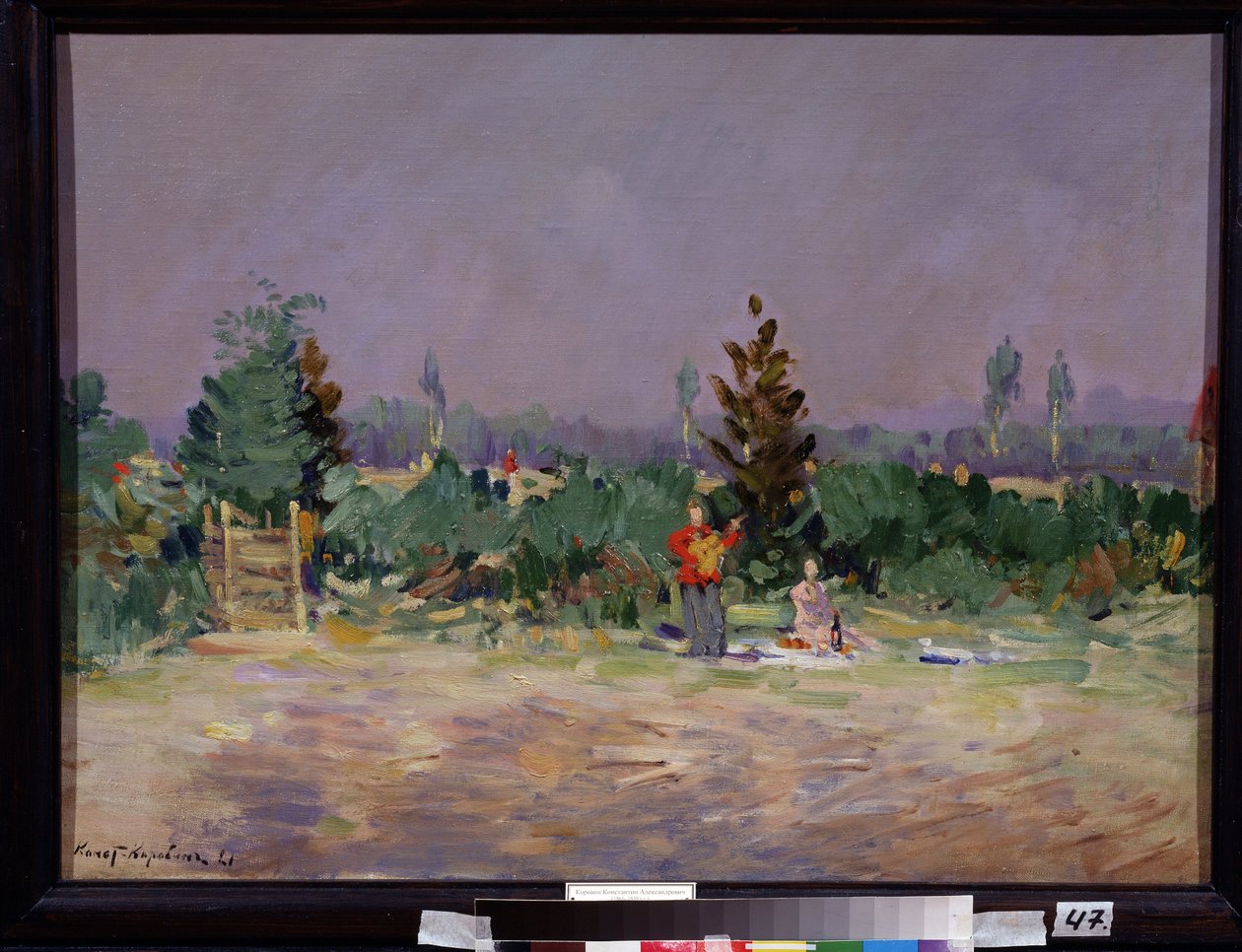 Kuuma päivä Moskovan lähellä (Kuuma päivä Moskovan lähellä). Pariskunta piknikillä maaseudulla, seisova mies soittaa kitaraa. Maalaus Konstantin Aleksejevitš Korovin (Konstantin Korovin) (1861-1939), öljy kankaalle tekijältä Konstantin Alekseevich Korovin