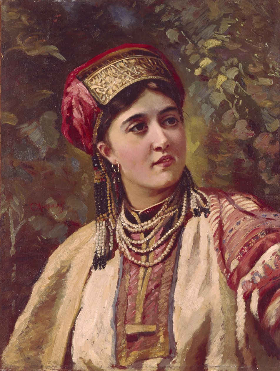 Tyttö perinteisessä mekossa tekijältä Konstantin Egorovich Makovsky