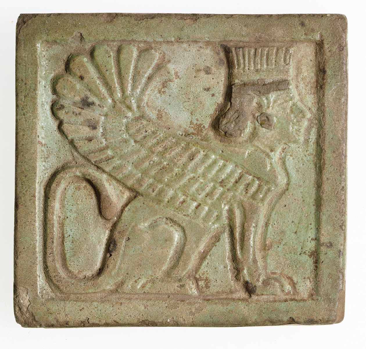 Plakki, jossa on siivekäs persialainen sfinksi, n. 525-401 eKr. (muovattu fajanssi) tekijältä Late Period Egyptian
