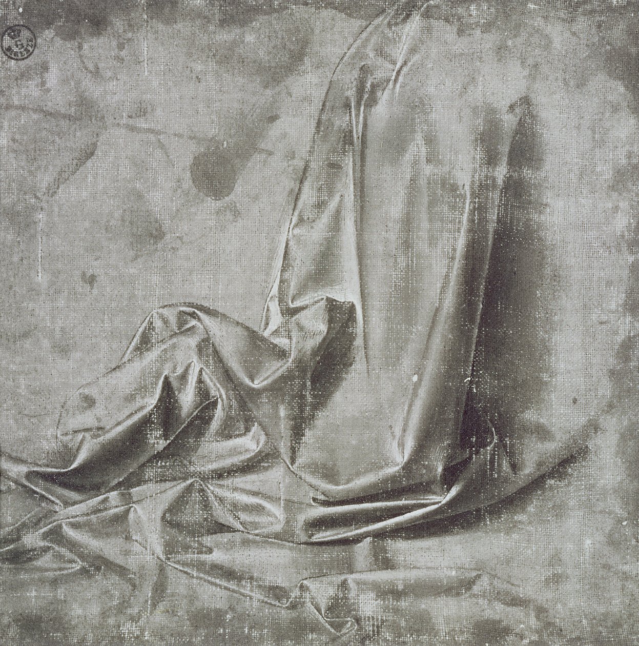 Draperia-tutkimus polvistuvalle hahmolle Profil Perdu -teoksessa oikealla, noin 1472-75 (sivellin ja harmaa tempera valkoisella kankaalle). tekijältä Leonardo da Vinci