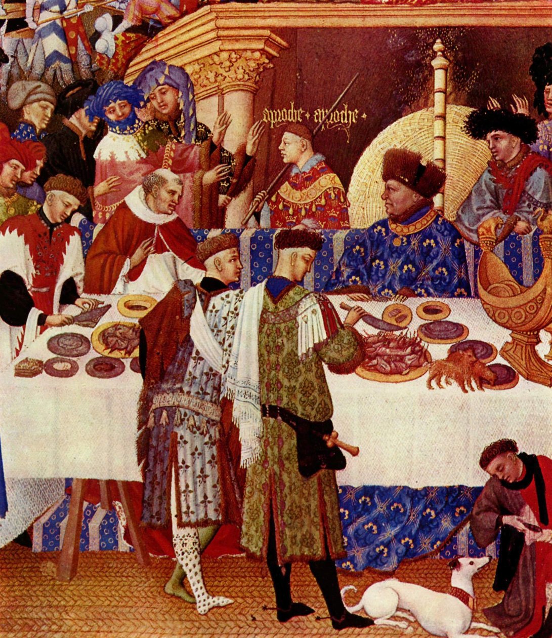 Duc de Berry istuu alhaalla oikealla, selkä tulta vasten, ja hänellä on sininen asu ja turkislakki. Hän pyytää perhettään ja ystäviään esittäytymään hänelle. Hänen takanaan on teksti "Approach Approach". Useat herttuan ystävät ja perheenjäsenet lähestyvät  tekijältä Limbourg Brothers