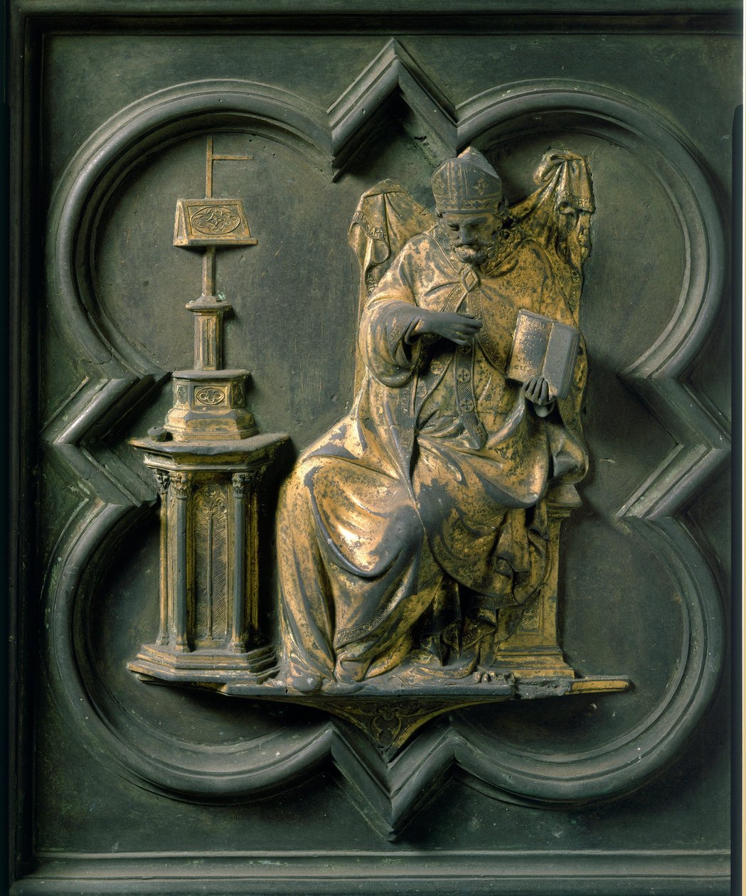 Pohjoinen portti (nimeltään Ristin portti, pohjoisessa), ulkopuoli: Pyhä Augustinus. Lorenzo Ghibertin (1378-1455) tekemä pronssiveistos tekijältä Lorenzo Ghiberti