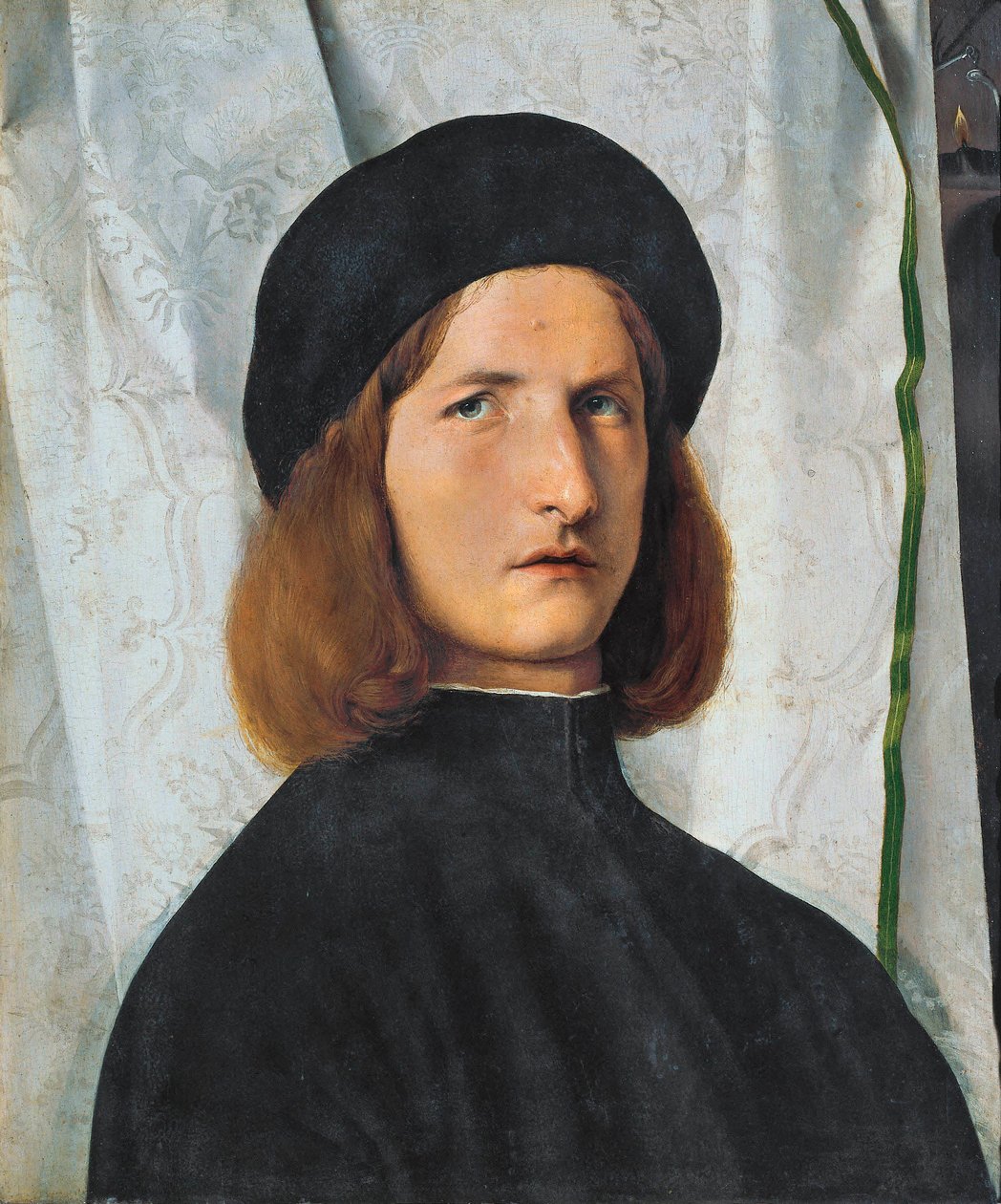 Nuoren miehen muotokuva lampun kanssa, 1508 tekijältä Lorenzo Lotto