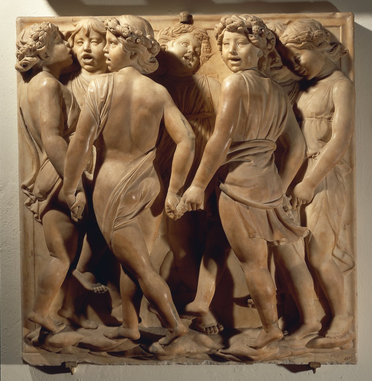 Ylistä häntä kuorossa (Psalmi 150, Kiittäkää Herraa), paneeli poikien kanssa laulamassa ja tanssimassa ympyrässä tekijältä Luca Della Robbia