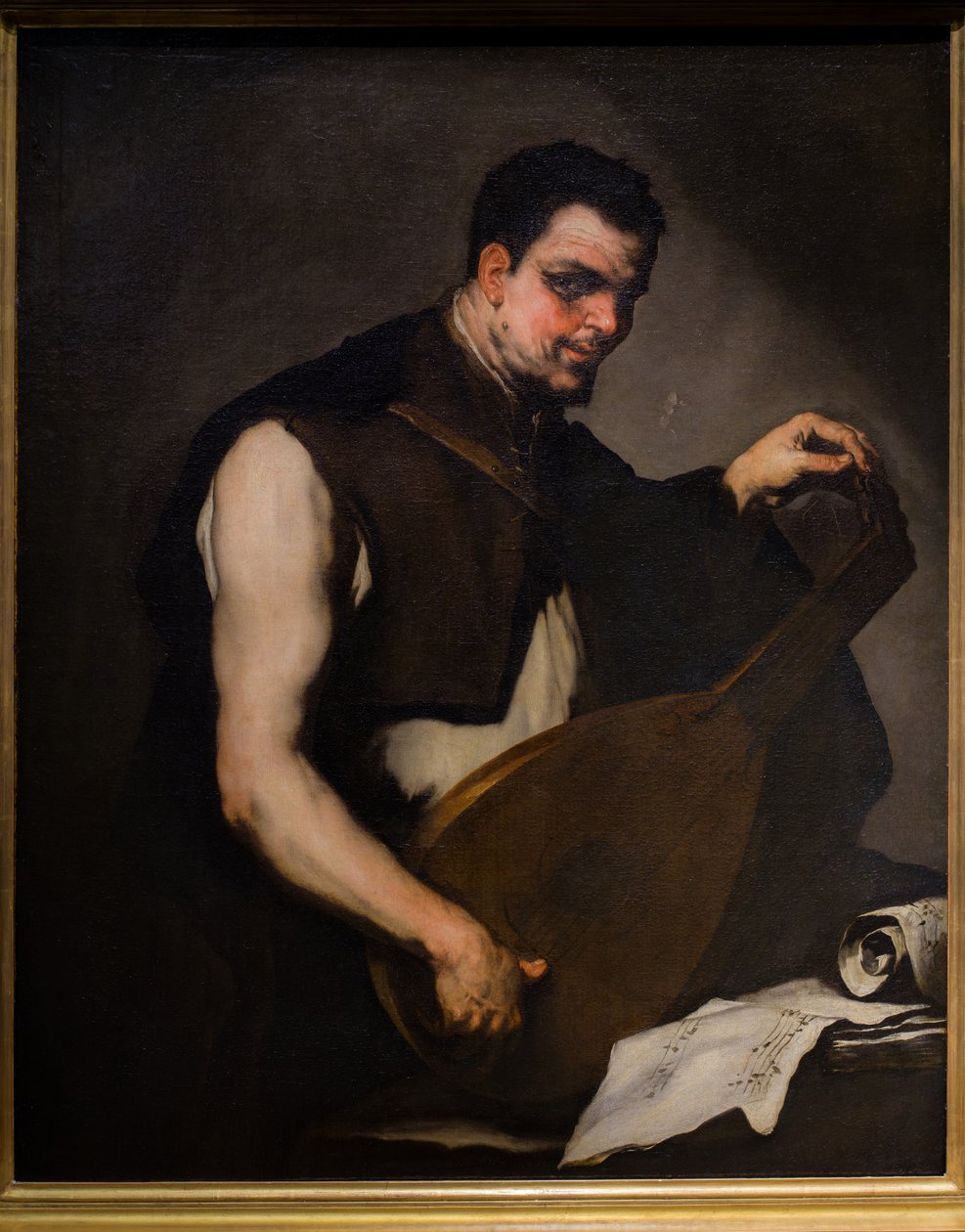 Muusikko virittää luuttuaan tekijältä Luca Giordano