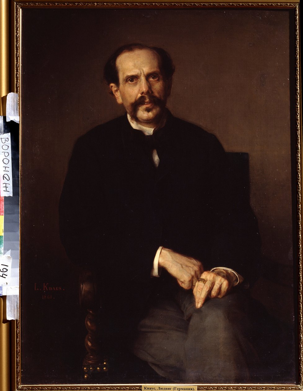 ""Miehen muotokuva"" Hän on pukeutunut mustaan ​​pukuun, sormessaan ritari. Ludwig Knausin (1829-1910) maalaus Ivan Kramskoy (tai Kramskoi) Kuvataidemuseo Voronezhissa (Voronezh), Venäjä. tekijältä Ludwig Knaus